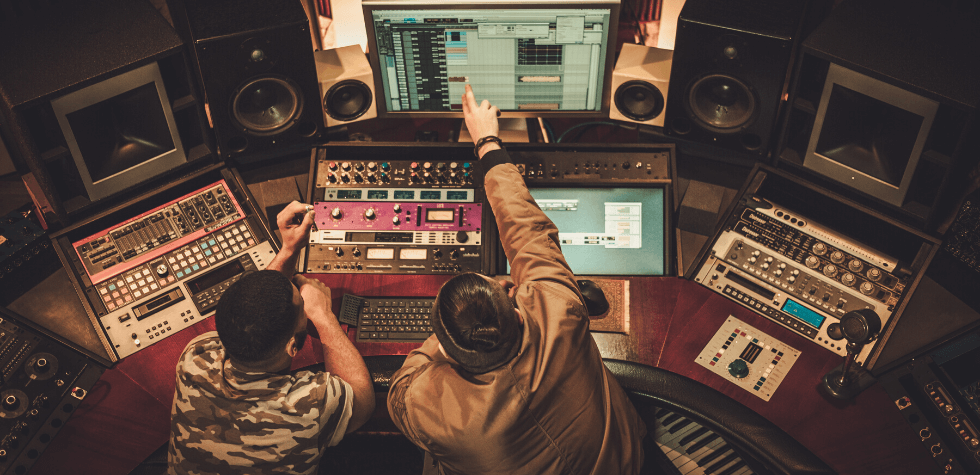 Tutor and student in a music studio